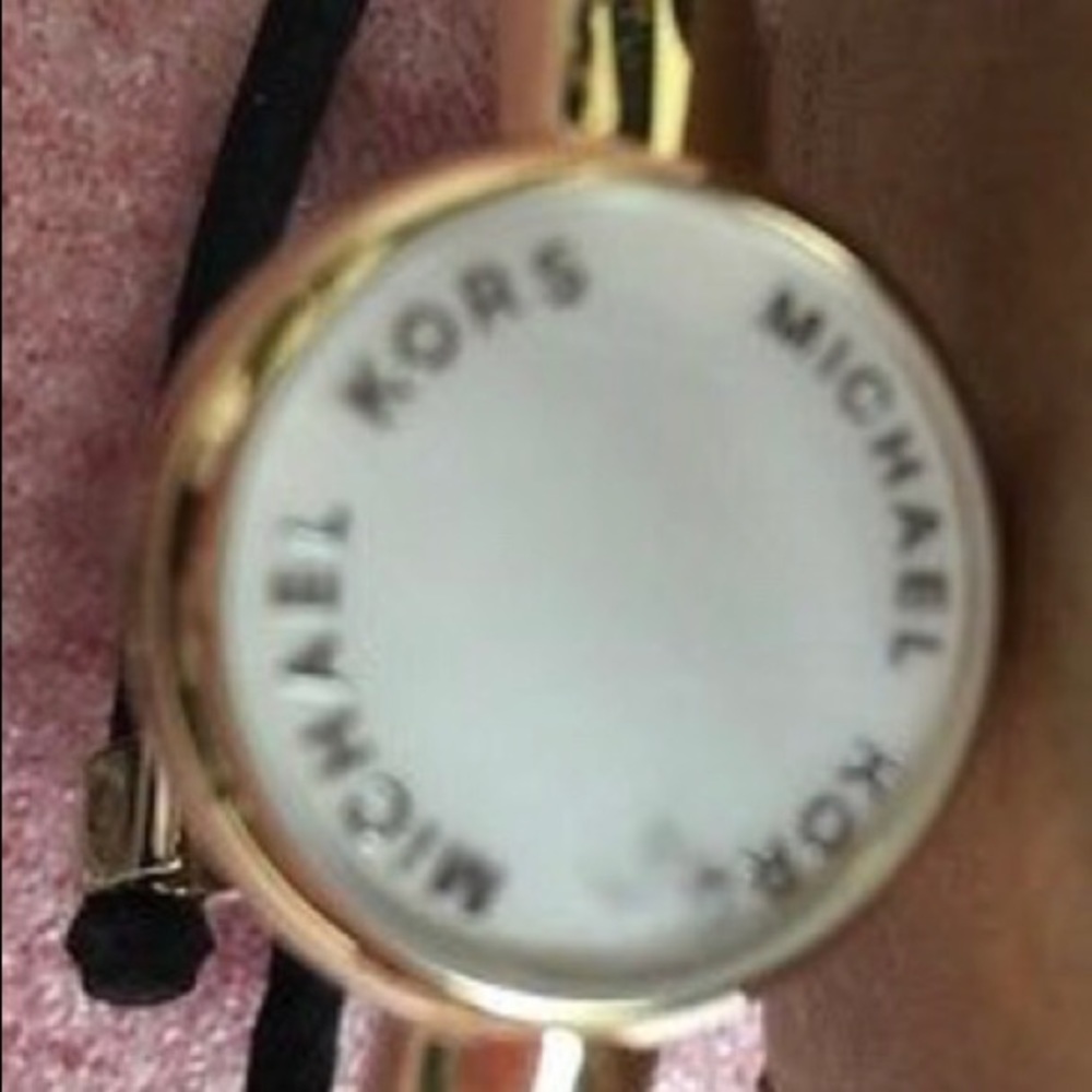Michael Kors fitness tracker.